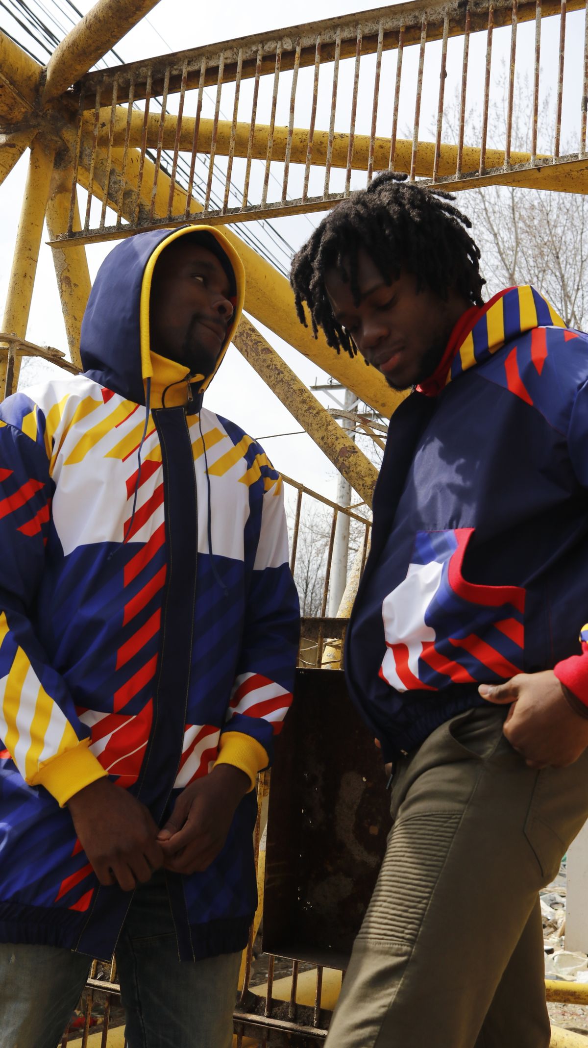 Men wearing contemporary jackets and shirts